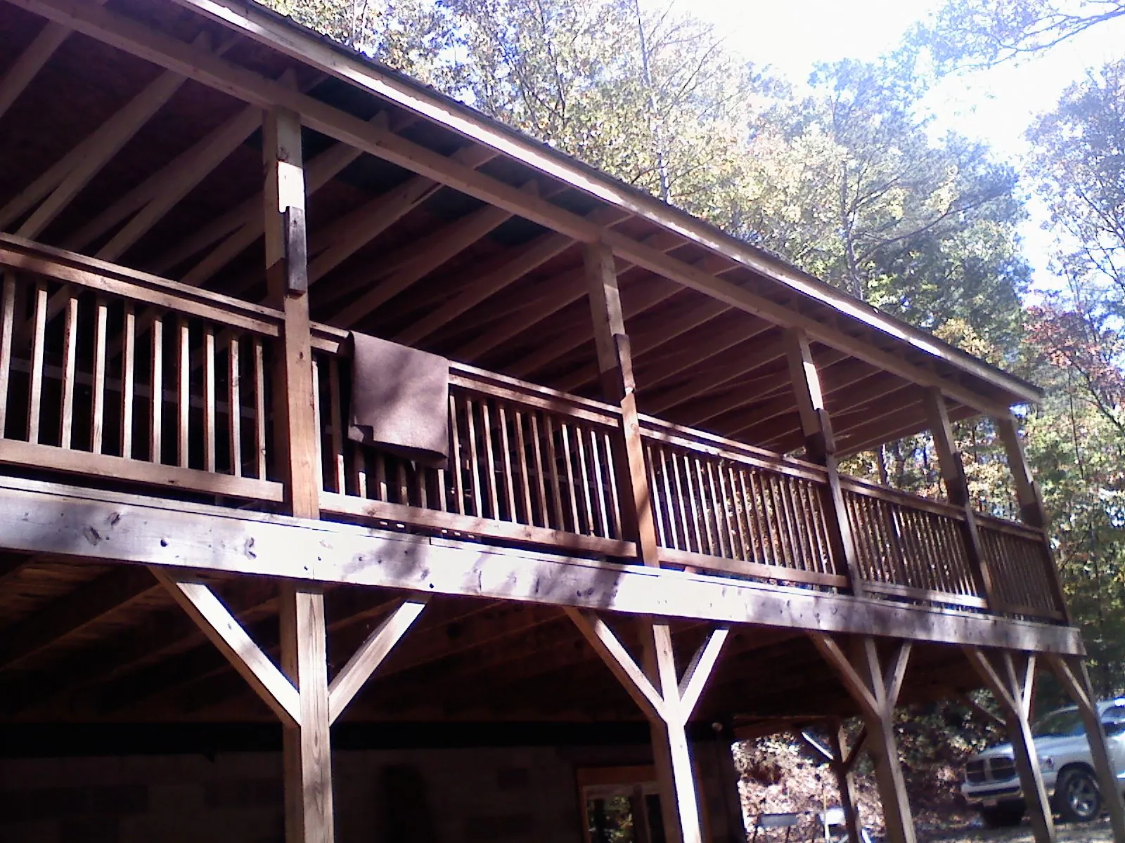 Timber framing under a new elevated porch and deck — Roof Leak Repair in West Hills by Roofing Brothers